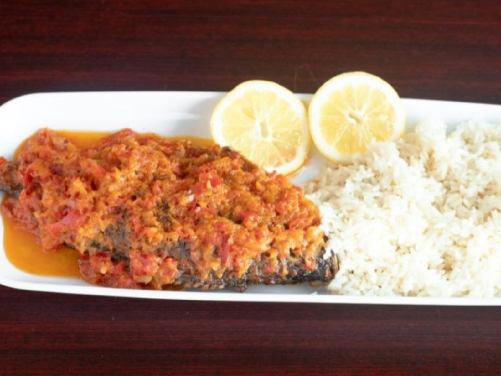 White Rice with fish sauce| African Foods, Akins Restaurant & Bar